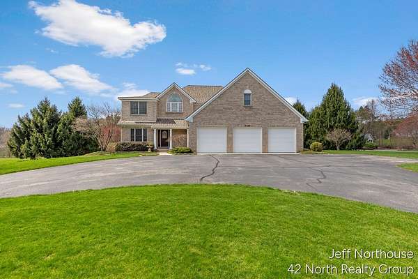 2 Acres of Land with Home for Sale in Caledonia, Michigan