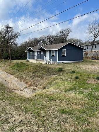 0.26 Acres of Commercial Land for Sale in Keene, Texas