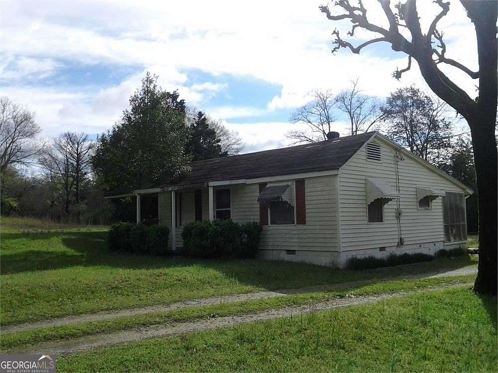 7.1 Acres of Land with Home for Sale in Lithonia, Georgia