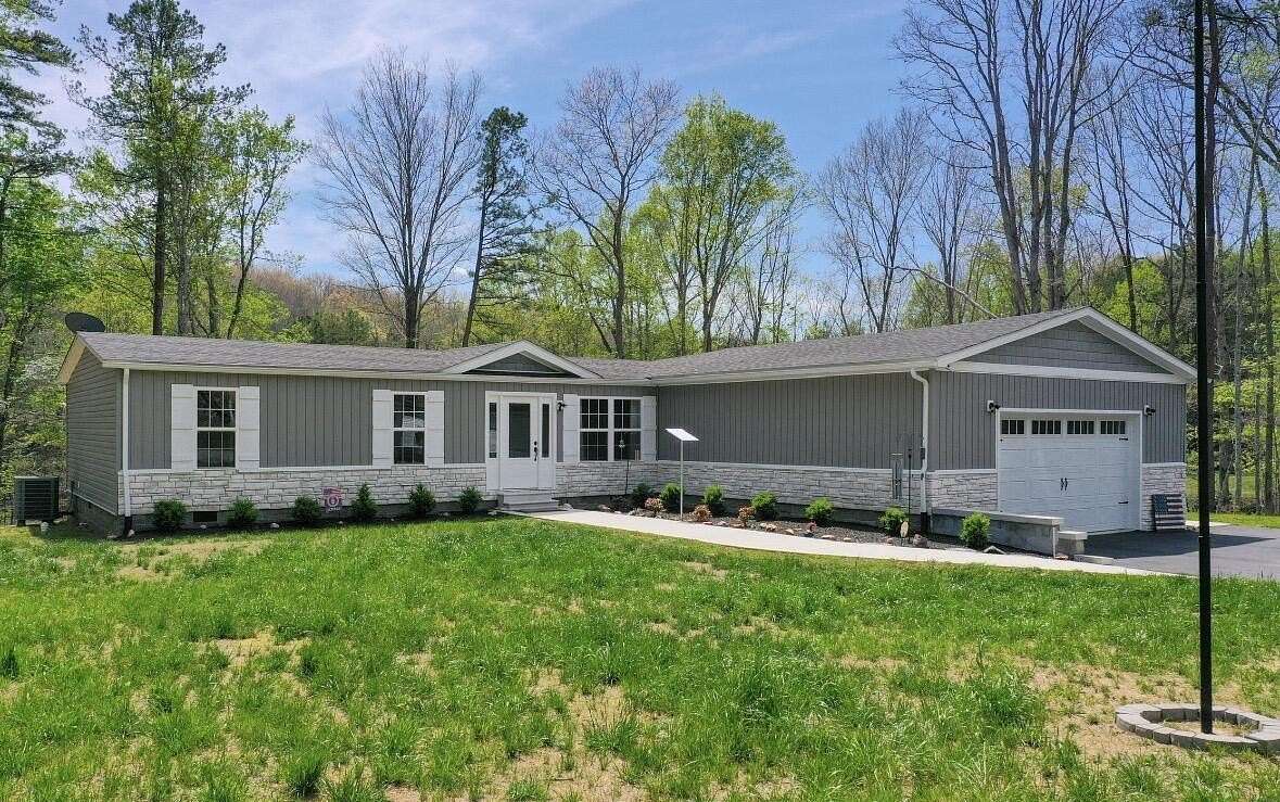 3.28 Acres of Land with Home for Sale in London, Kentucky