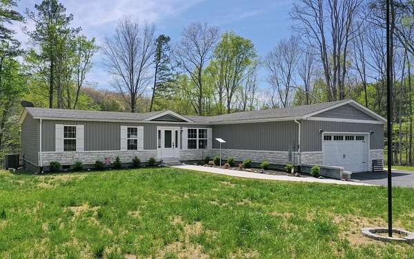 3.28 Acres of Land with Home for Sale in London, Kentucky