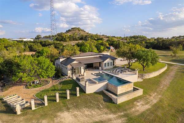 15.5 Acres of Recreational Land with Home for Sale in Blanco, Texas