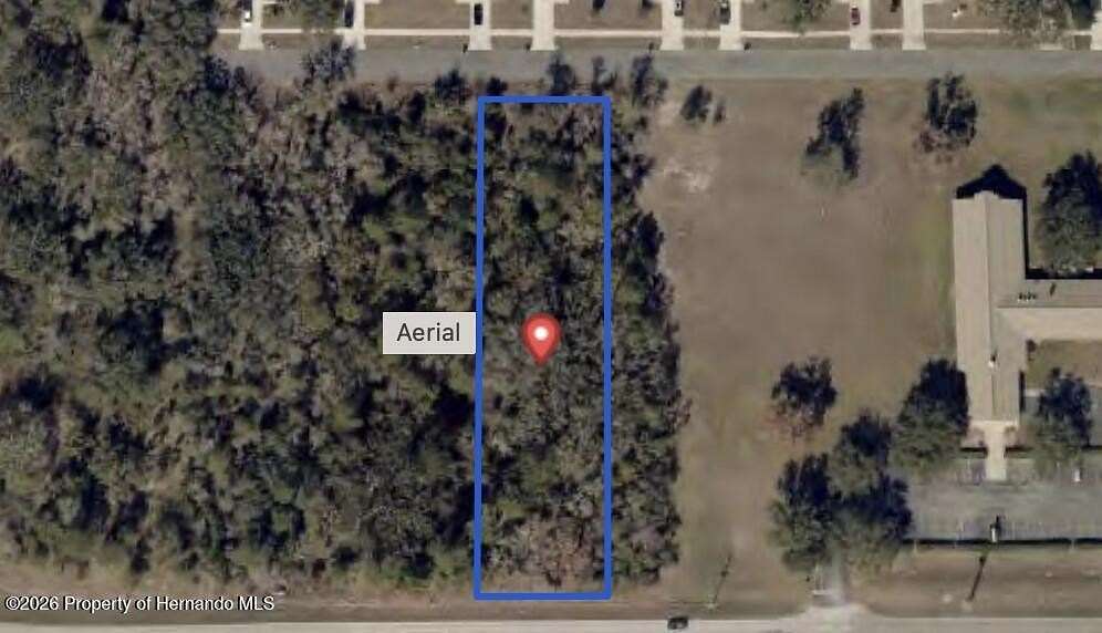 0.9 Acres of Commercial Land for Sale in Spring Hill, Florida