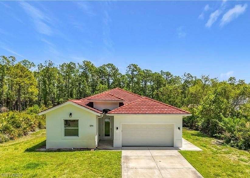 2.5 Acres of Land with Home for Sale in Naples, Florida