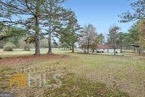 2.78 Acres of Land with Home for Sale in Fayetteville, Georgia