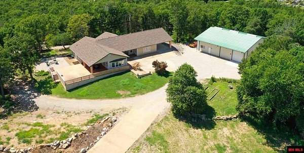 5.6 Acres of Land with Home for Sale in Mountain Home, Arkansas