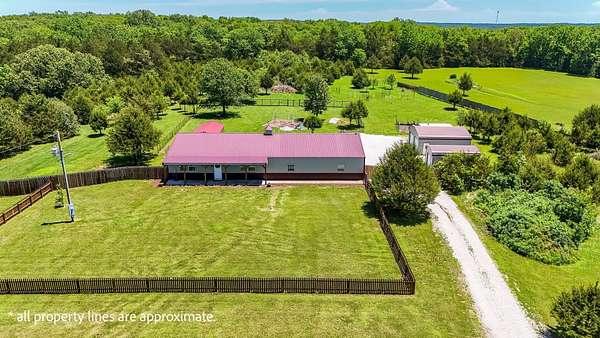 5 Acres of Land with Home for Sale in Flemington, Missouri