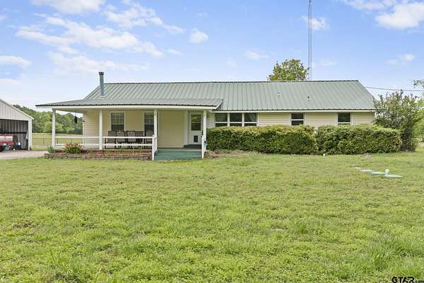 32.4 Acres of Agricultural Land with Home for Sale in Big Sandy, Texas