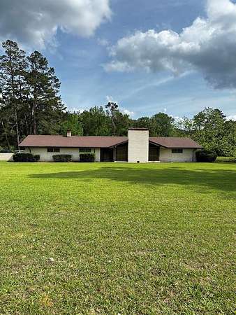 7.25 Acres of Land with Home for Sale in Timpson, Texas