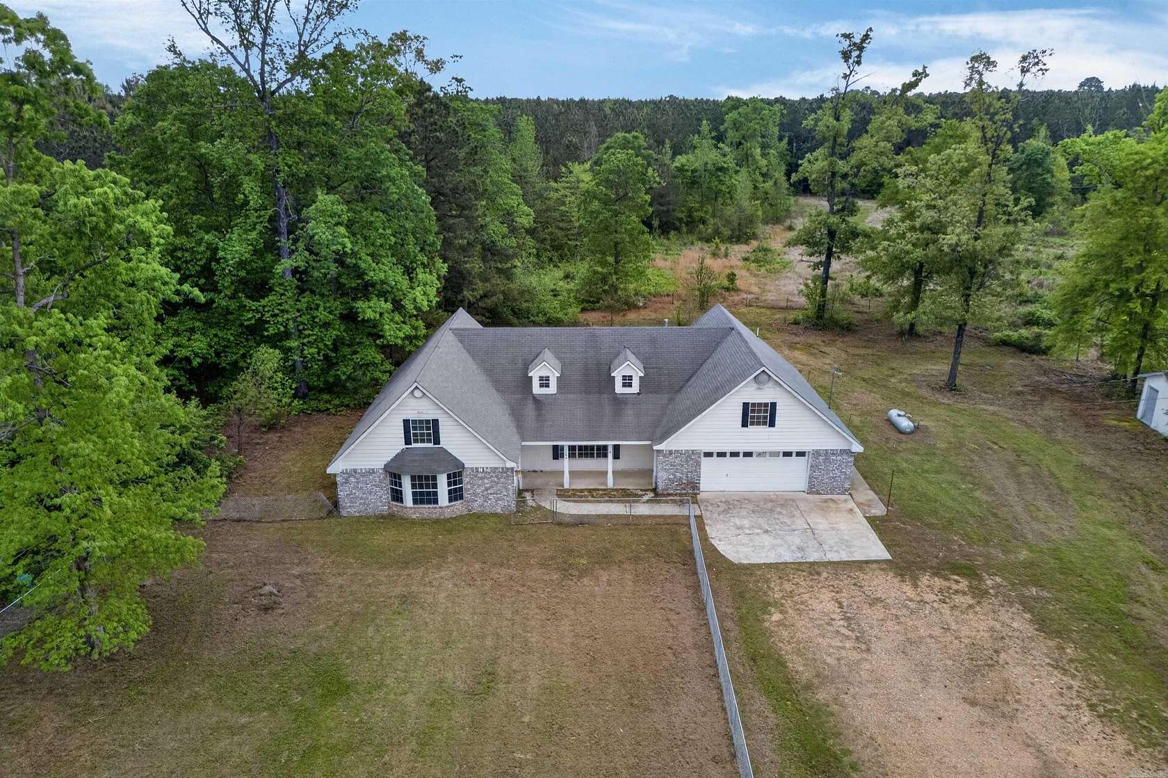 7 Acres of Land with Home for Sale in Dierks, Arkansas