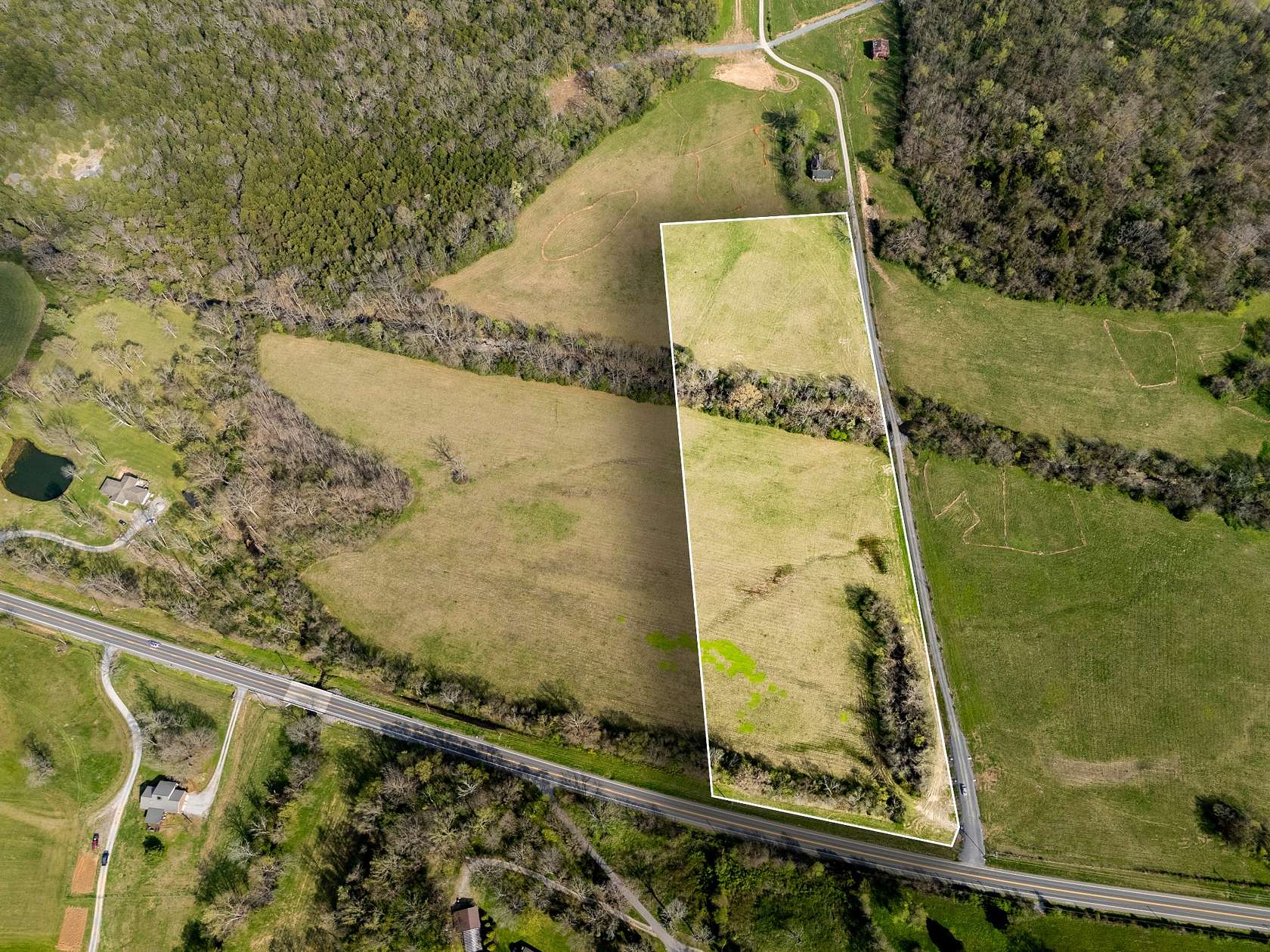 10.6 Acres of Land for Sale in College Grove, Tennessee