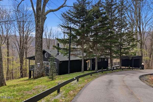 1.8 Acres of Land with Home for Sale in Roan Mountain, Tennessee