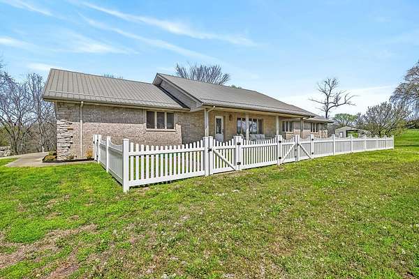 289 Acres of Land with Home for Sale in Aldrich, Missouri