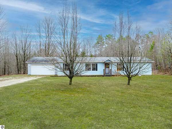 2.52 Acres of Land with Home for Sale in Fife Lake, Michigan