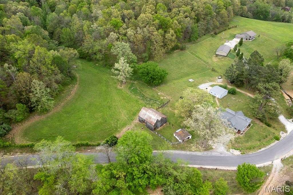 6.2 Acres of Land with Home for Sale in Jackson, Missouri