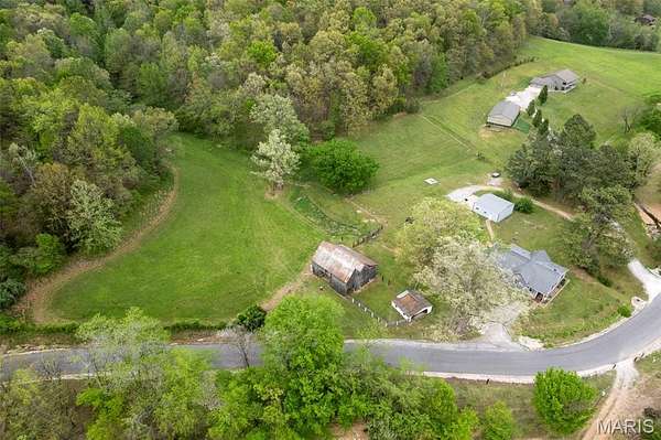 6.2 Acres of Land with Home for Sale in Jackson, Missouri