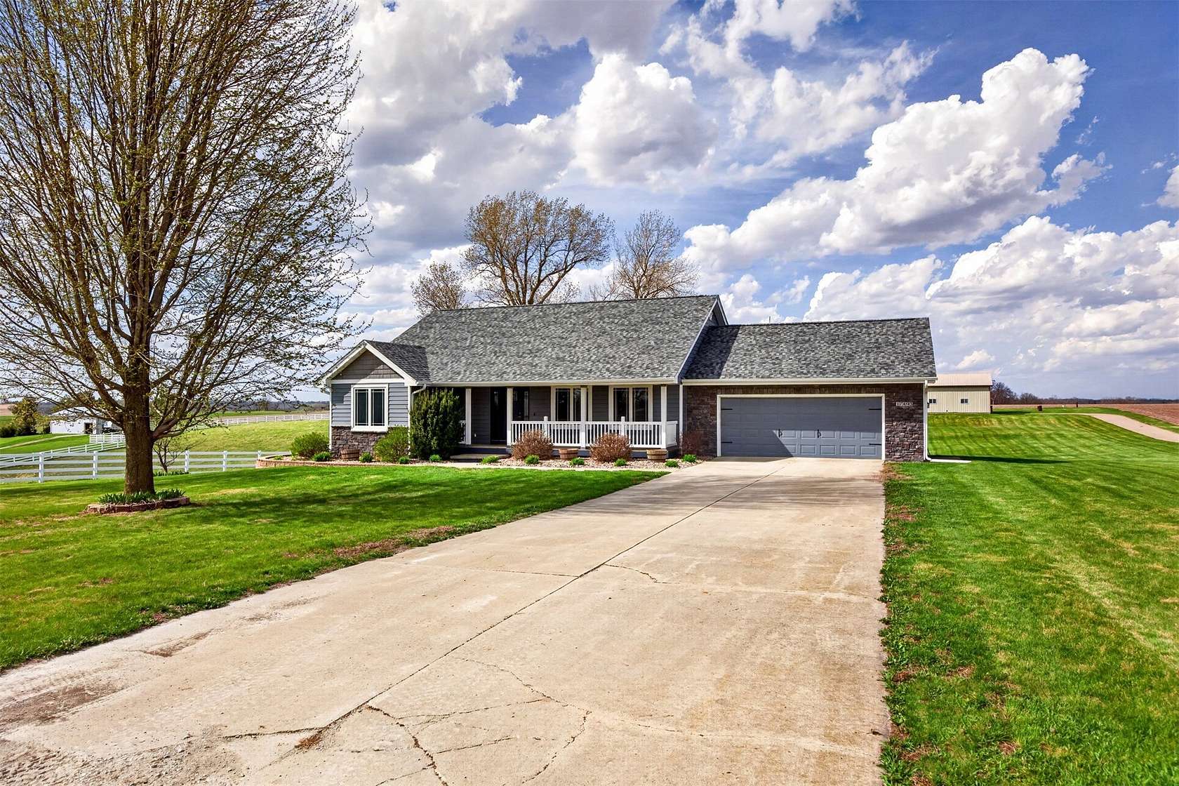 5 Acres of Land with Home for Sale in Earlham, Iowa