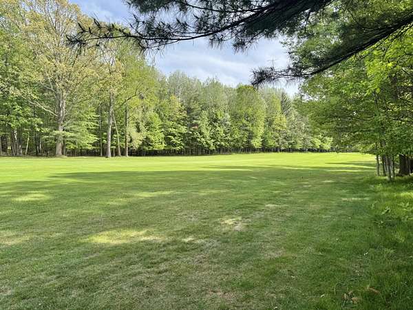 0.51 Acres of Residential Land for Sale in Canadian Lakes, Michigan
