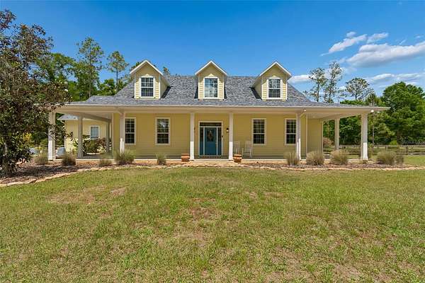 1.85 Acres of Land with Home for Sale in Land O' Lakes, Florida