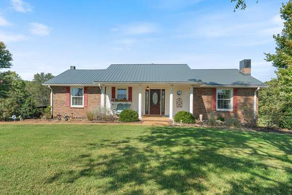 6.87 Acres of Land with Home for Sale in Bon Aqua, Tennessee