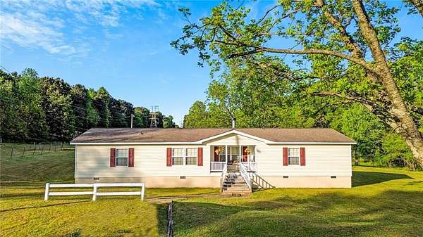 6 Acres of Land with Home for Sale in Oakwood, Georgia