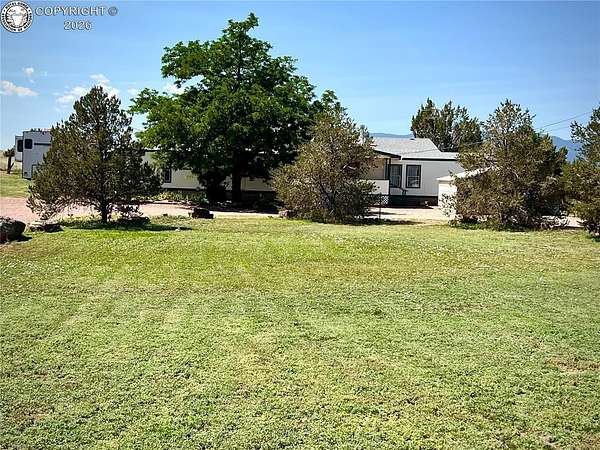 7.79 Acres of Land with Home for Sale in Florence, Colorado