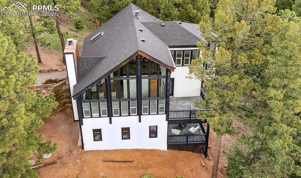 2.67 Acres of Land with Home for Sale in Larkspur, Colorado