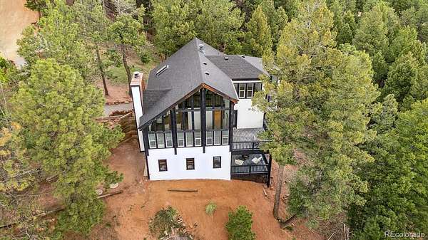 2.67 Acres of Land with Home for Sale in Larkspur, Colorado