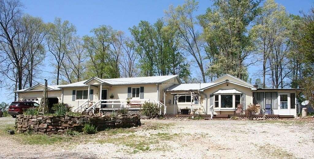 5.4 Acres of Land with Home for Sale in Springville, Tennessee