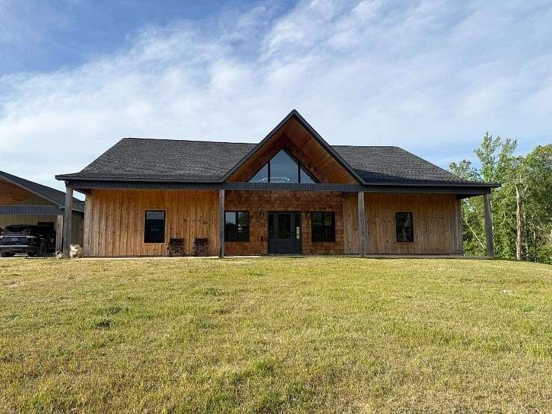 57 Acres of Land with Home for Sale in Fulton, Mississippi