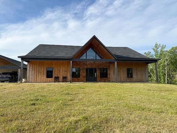 60 Acres of Land with Home for Sale in Fulton, Mississippi