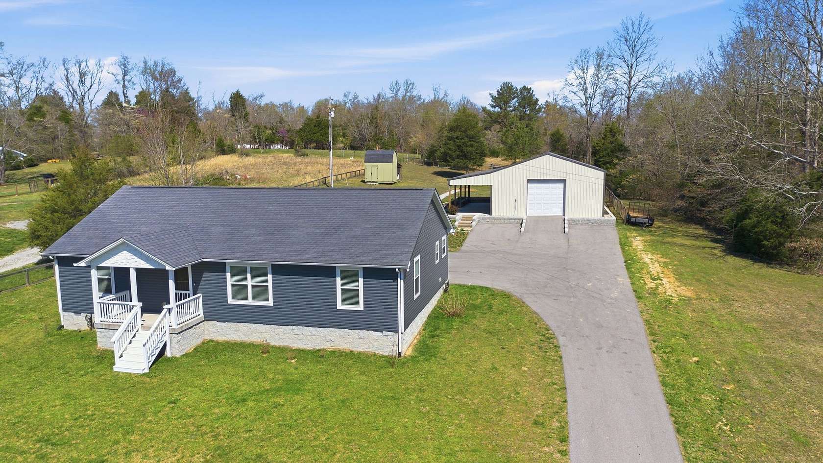 8.59 Acres of Land with Home for Sale in Charlotte, Tennessee