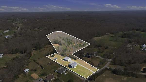 8.59 Acres of Land with Home for Sale in Charlotte, Tennessee