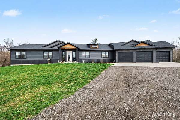 14 Acres of Land with Home for Sale in Sand Lake, Michigan