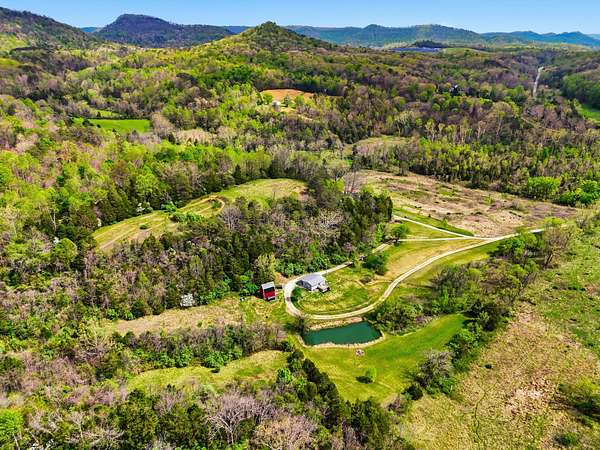 8 Acres of Land with Home for Sale in Irvine, Kentucky