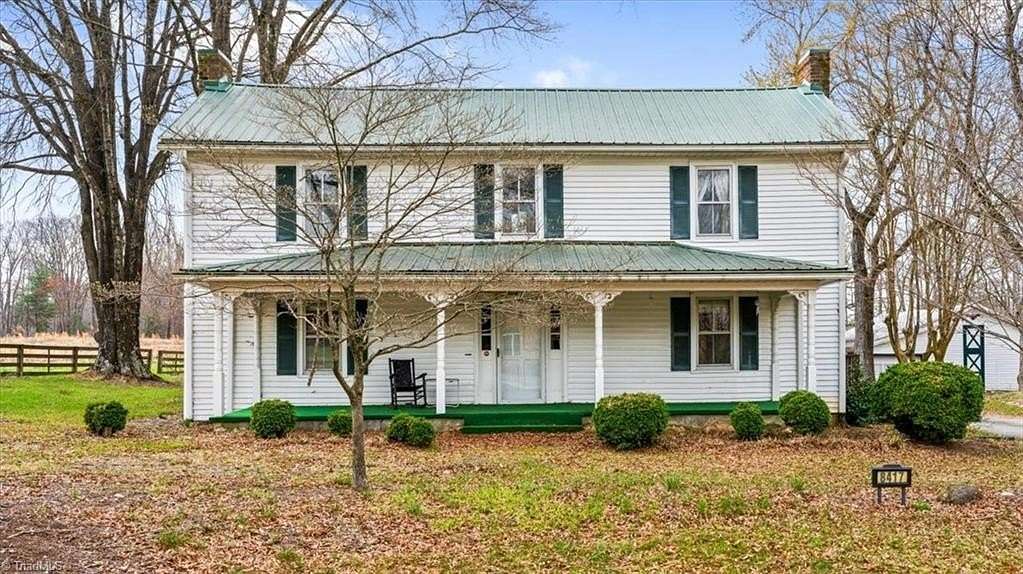 9.25 Acres of Land with Home for Sale in Oak Ridge, North Carolina