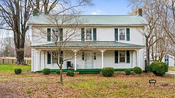 9.25 Acres of Land with Home for Sale in Oak Ridge, North Carolina