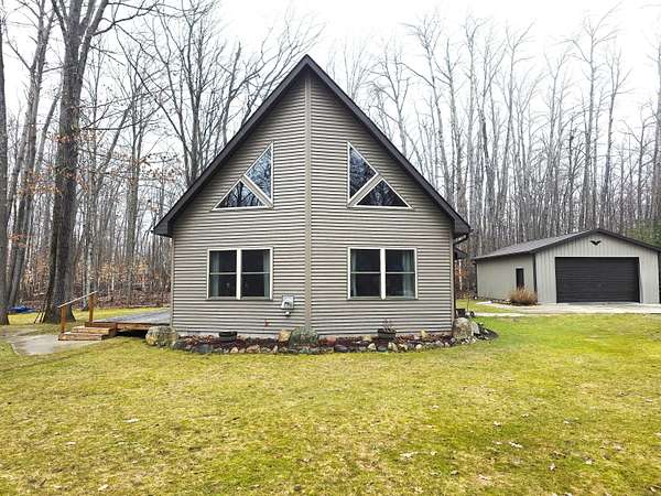 2.5 Acres of Land with Home for Sale in Indian River, Michigan