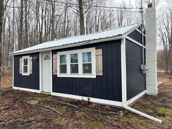 2.5 Acres of Land with Home for Sale in Levering, Michigan