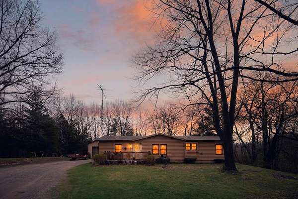 5 Acres of Land with Home for Sale in Clarklake, Michigan