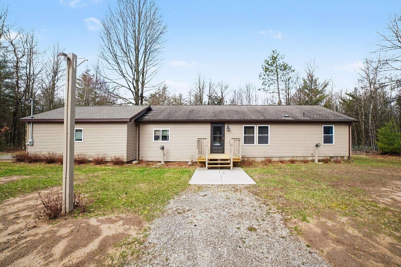 5 Acres of Land with Home for Sale in Houghton Lake, Michigan