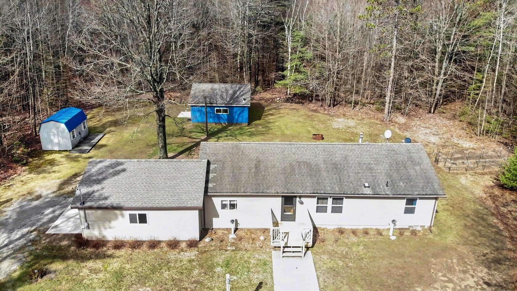 5 Acres of Land with Home for Sale in Houghton Lake, Michigan