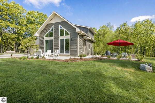 5 Acres of Land with Home for Sale in Cedar, Michigan