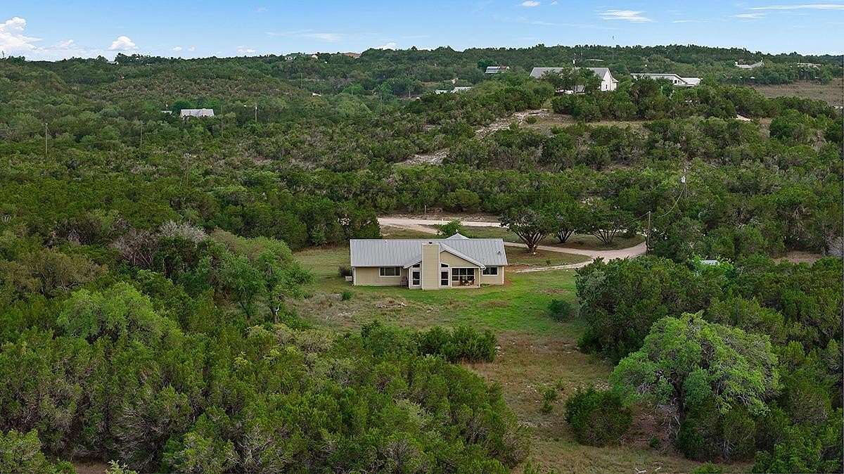 12.8 Acres of Land with Home for Sale in Dripping Springs, Texas