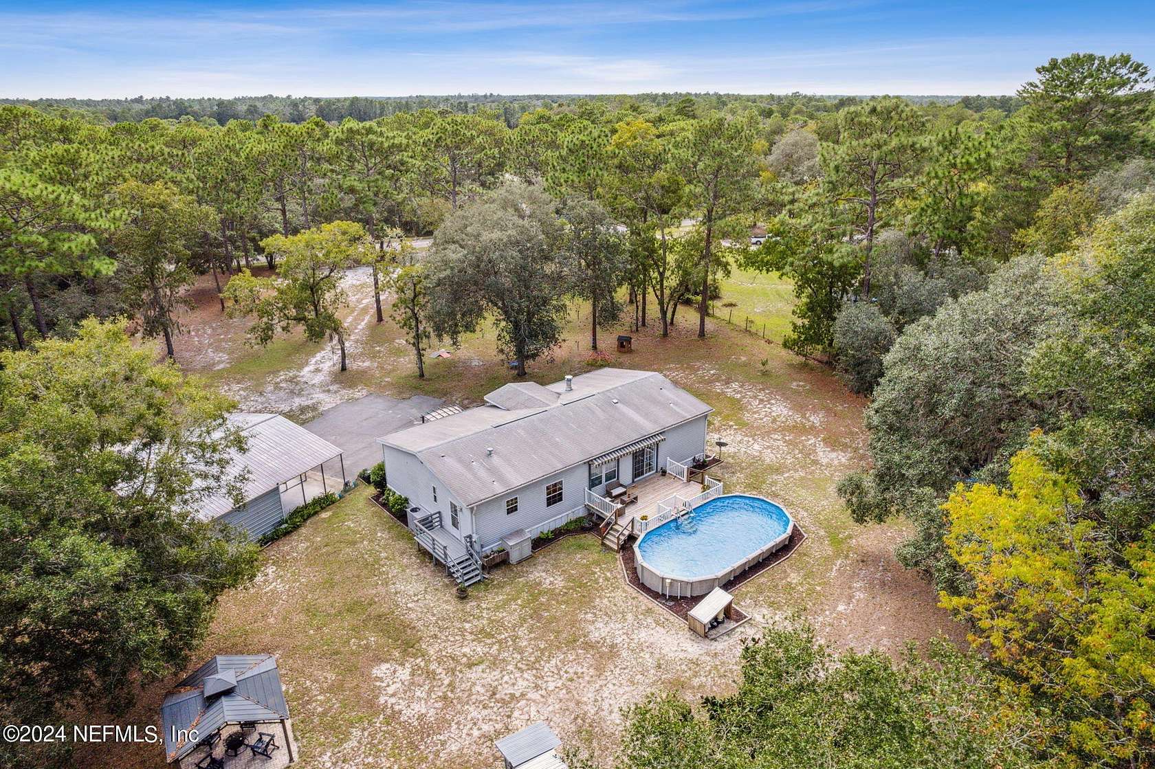 4 Acres of Land with Home for Sale in Pomona Park, Florida