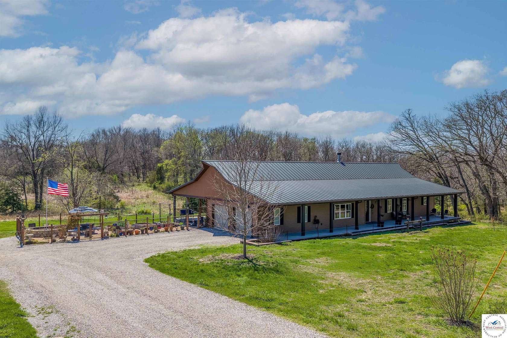 6.4 Acres of Land with Home for Sale in Sedalia, Missouri