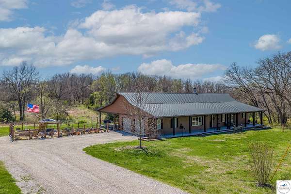 6.4 Acres of Land with Home for Sale in Sedalia, Missouri