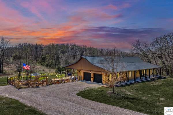 6.4 Acres of Land with Home for Sale in Sedalia, Missouri