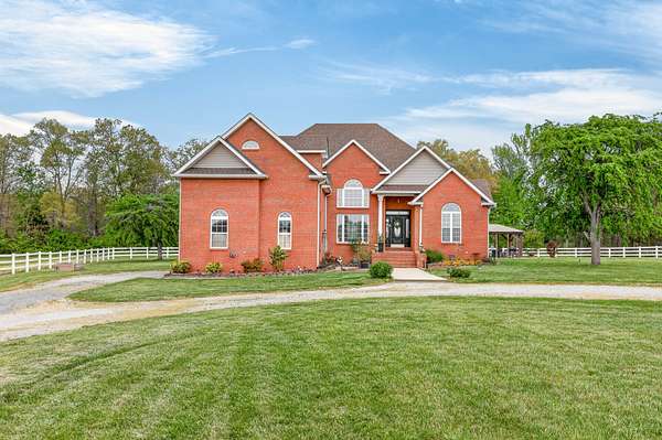 10.2 Acres of Land with Home for Sale in Bradyville, Tennessee