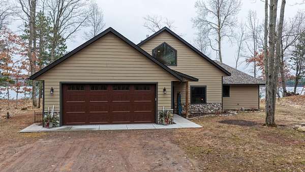 1.57 Acres of Land with Home for Sale in Spooner, Wisconsin